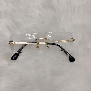 Stylish Gold and Black Rimless Glasses